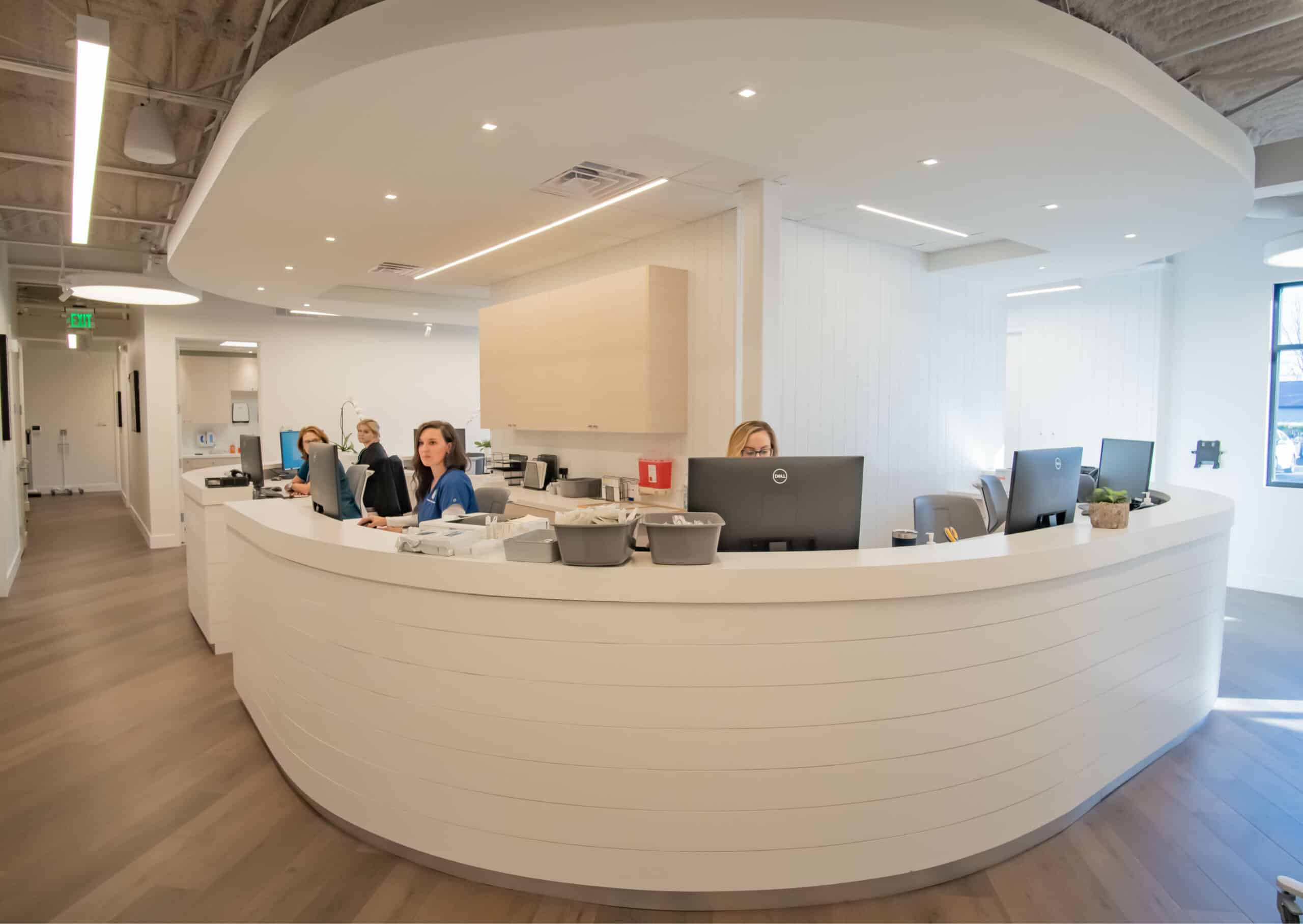 Melissa Marrocco, FNP-BC and Kelly Knox, FN-BC, FNP-C sit at the clinical desk in Atracare - Ocean View while they prepare to see patients. Atracare - Ocean View is a brand new, state-of-the-art full service facility designed with the patient experience in mind.